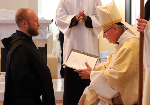 Benedictine Brother Gabriel (formerly Daniel) Chinn professes simple vows in the Benedictine Order in the presence of Abbot Benedict Neenan, OSB, on Feb. 3 in the Basilica of the Immaculate Conception at Conception Abbey in northwestern Missouri on Feb. 3.